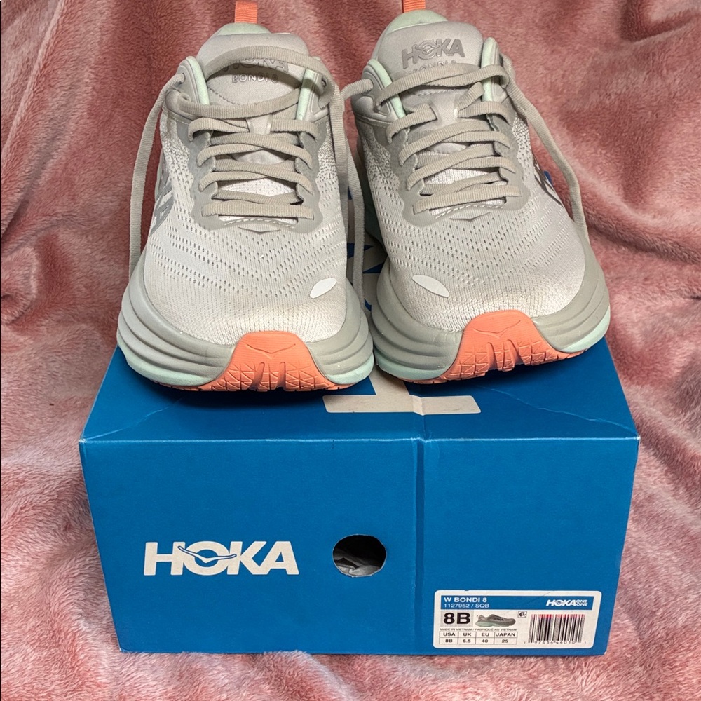 Hoka Bondi 8 size 8B women’s shoe. 
Mint, corral and gray. Worn 1 time.